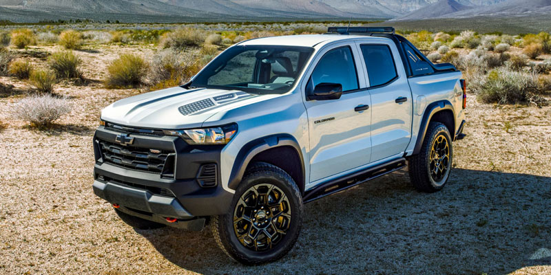 A white 2026 Chevrolet Colorado pickup truck parked in Austin, TX.